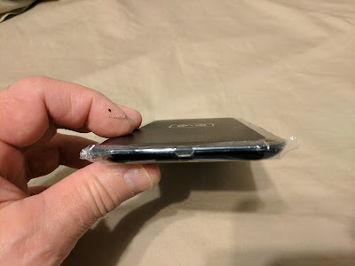 Chinese Charging Pad with MicroUSB Port Oriented Upside-Down Chinese wireless charging pad with microUSB port oriented upside-down according to familiar US practices.