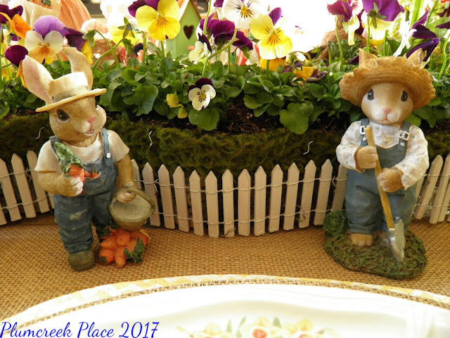 burlap chargers, burlap table covering, daffodils, Domestications Bunny Plates, Easter decor, Easter tablescape, Here comes Peter Cottontail, Paper Mache Bunnies, Peter Cottontail, violas
