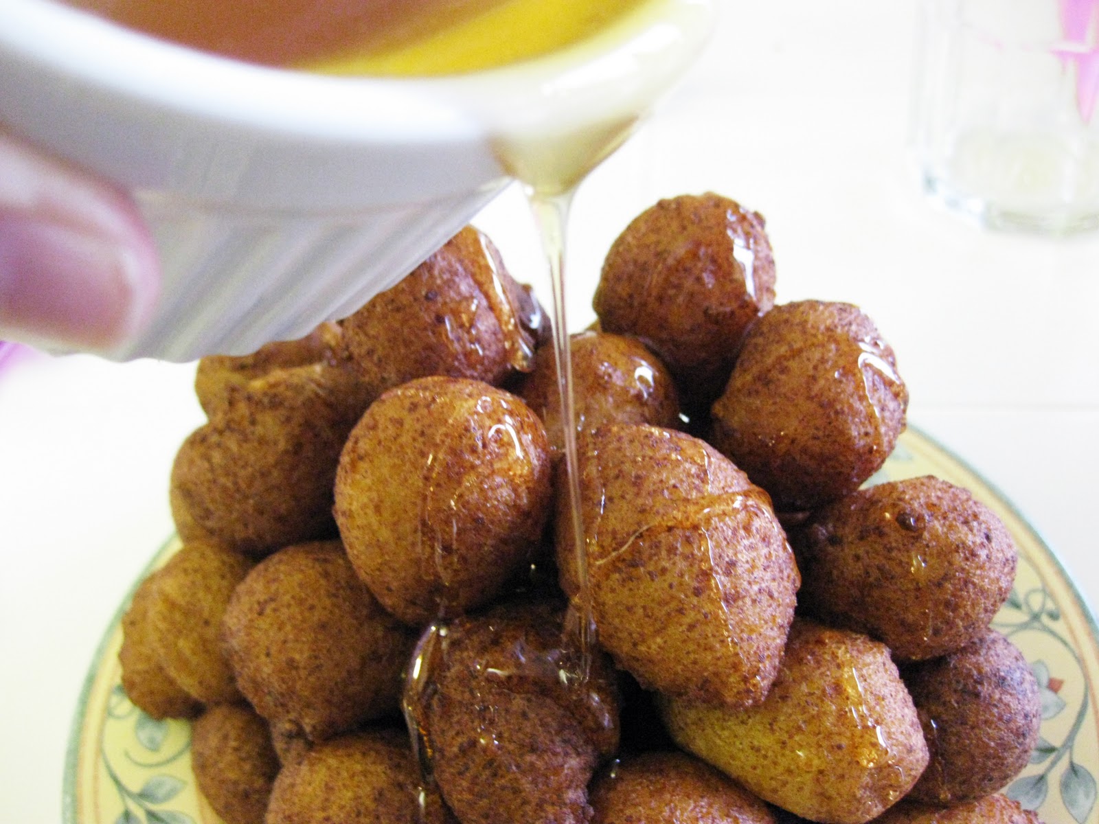 Delicious Sfingi drizzled with honey