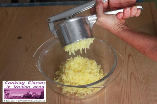 Passapatate a special potato ricer for making gnocchi Special potato ricer for making gnocchi called passapatate in Italy by Mama Isa
