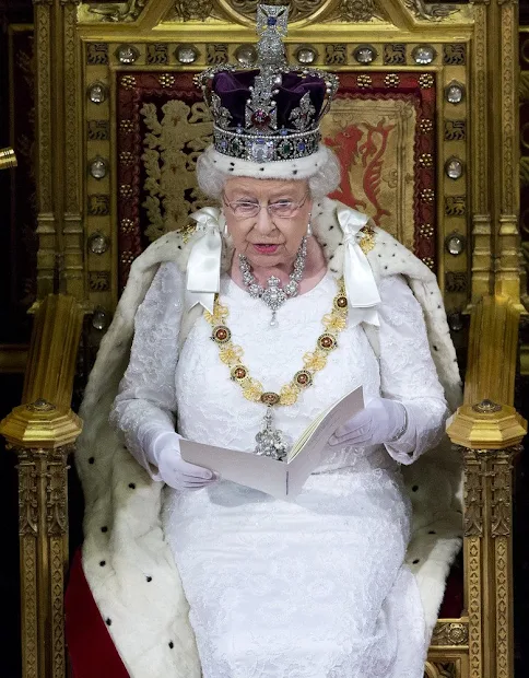 Queen Elizabeth II reads the Queen's Speech from the throne during State Opening of Parliament in the House of Lords at the Palace of Westminster