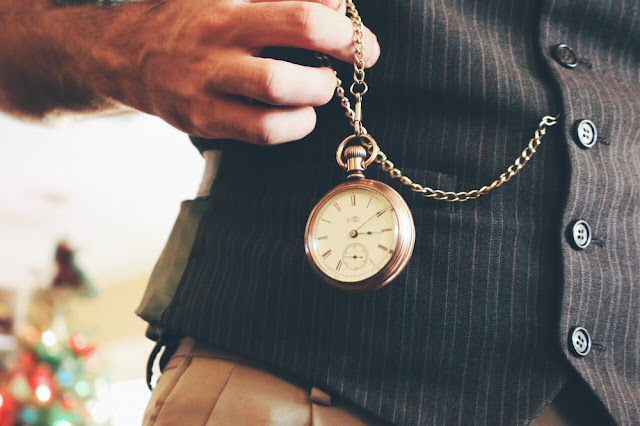 Man holding a watch