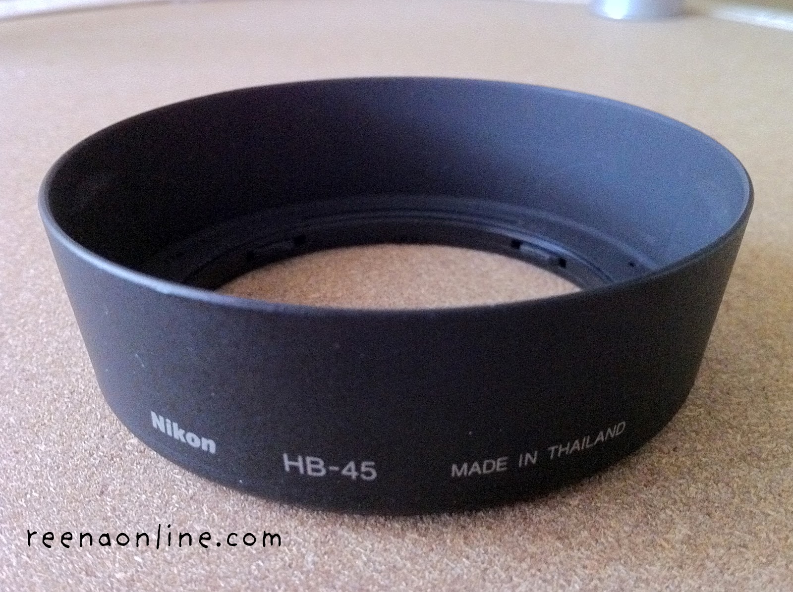 Reena's Online Nikon Lens Hood / Nikon Remote Control