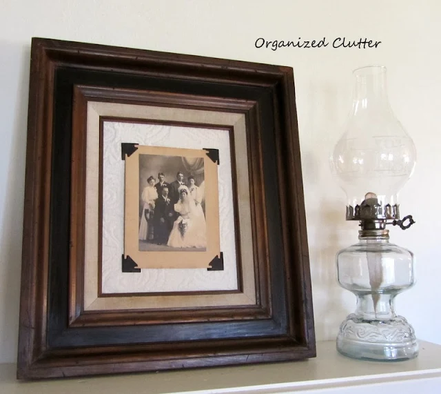 A Consignment Shop Frame & Photo Mounting Corners www.organizedclutterqueen.blogspot.com