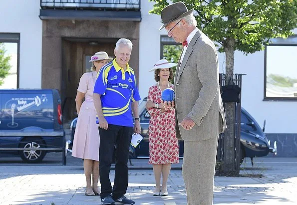 King Carl XVI Gustaf and Queen Silvia of Sweden took part in the King's Rally on the island of Öland. floral print summer dress