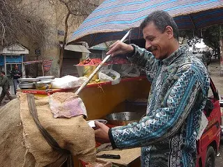 Serving local street food photo by dlisbona