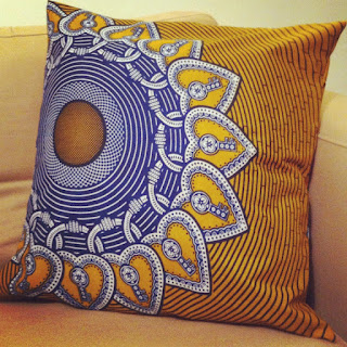 Handmade cushion made with African tribal print material from Ridley Road Market