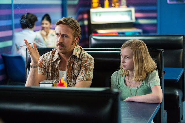 Ryan Gosling and Angourie Rice as father and daughter Holland and Holly March. gosling angourie rice nice guys movie still