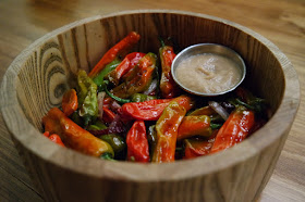 Shishito Peppers, Sweet Onions, Toasted Garlic, Sea Salt, Aioli at Bodega Tavern & Kitchen in McAllen