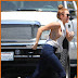 Miley Cyrus Risks  in Loose-Cut White Blouse