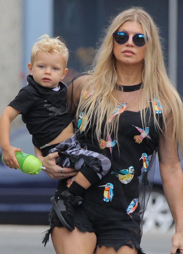 Fergie shows good form in short shorts ride with his son, Axl