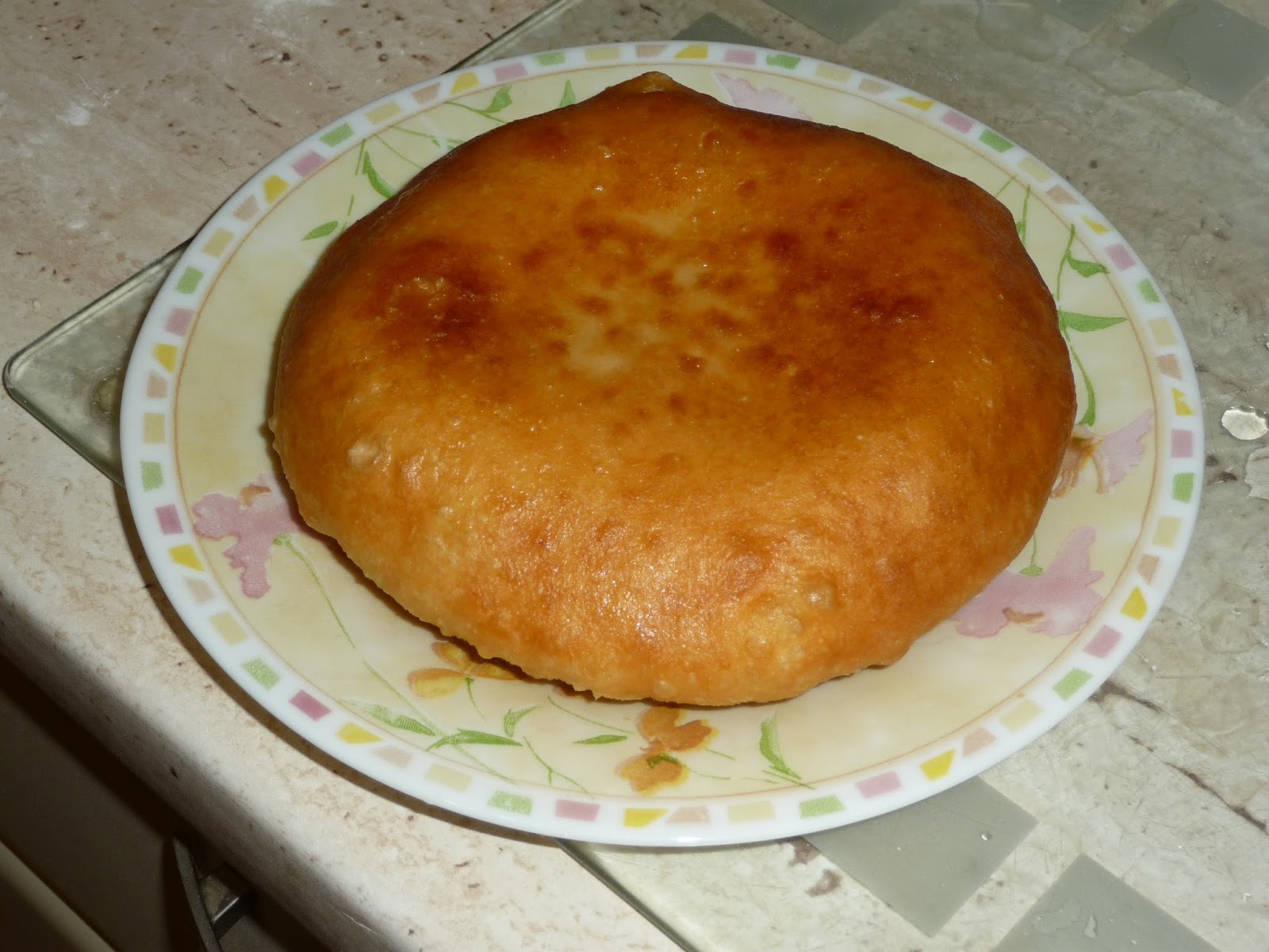 Лепешки на крышке казана