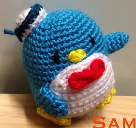 http://www.ravelry.com/patterns/library/crochet-penguin-sam-and-amy-doll-toy
