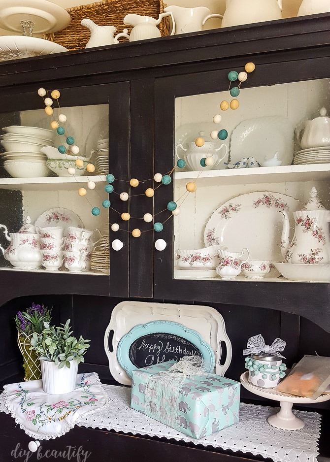 I used vintage decor items to style a shabby modern birthday party, as well as select items from Minted.com!