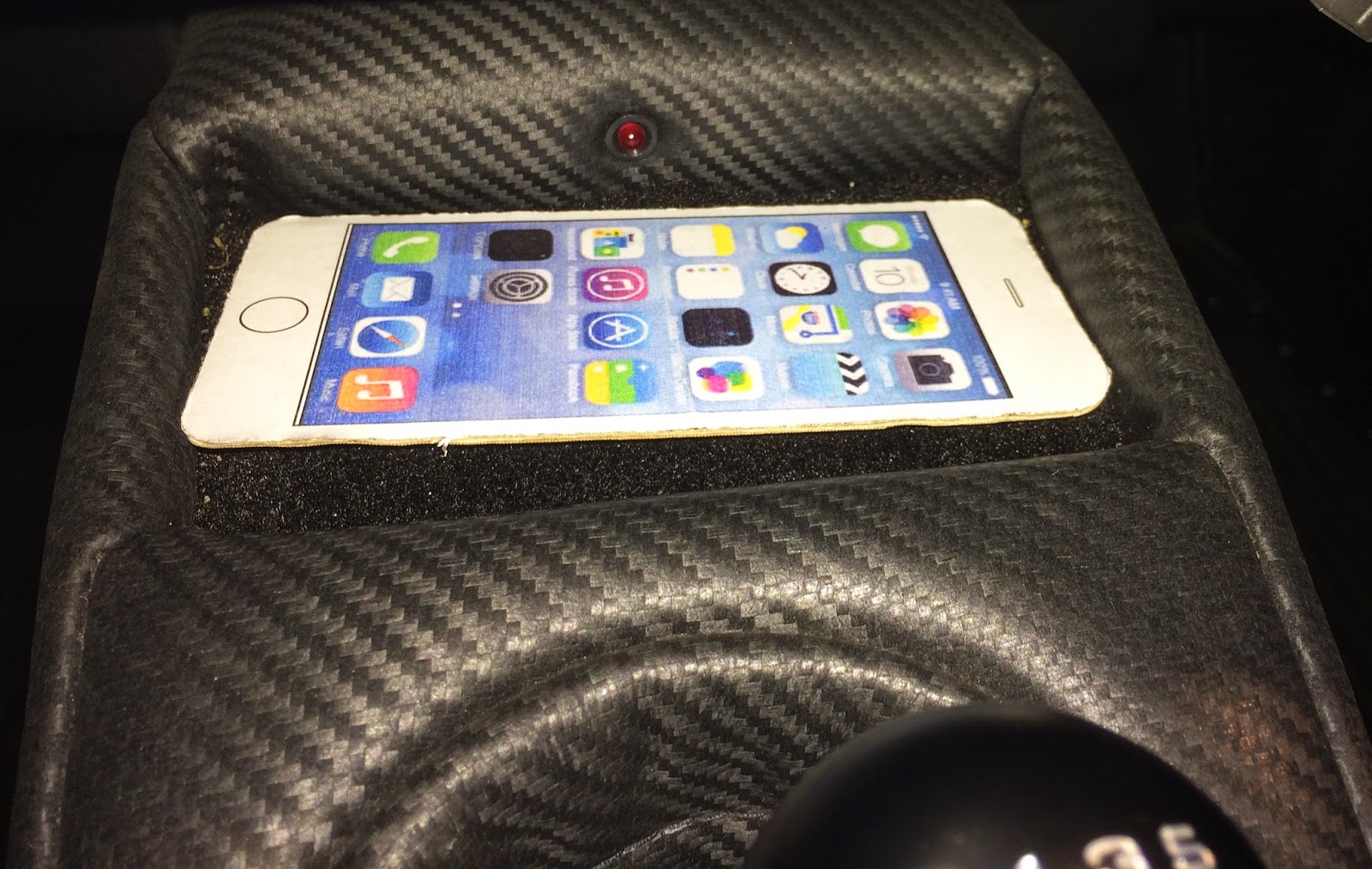 iPhone 6 fits just perfect in Caterham transmission tunnel top. iPhone 6 fits just perfect in Caterham transmission tunnel top.