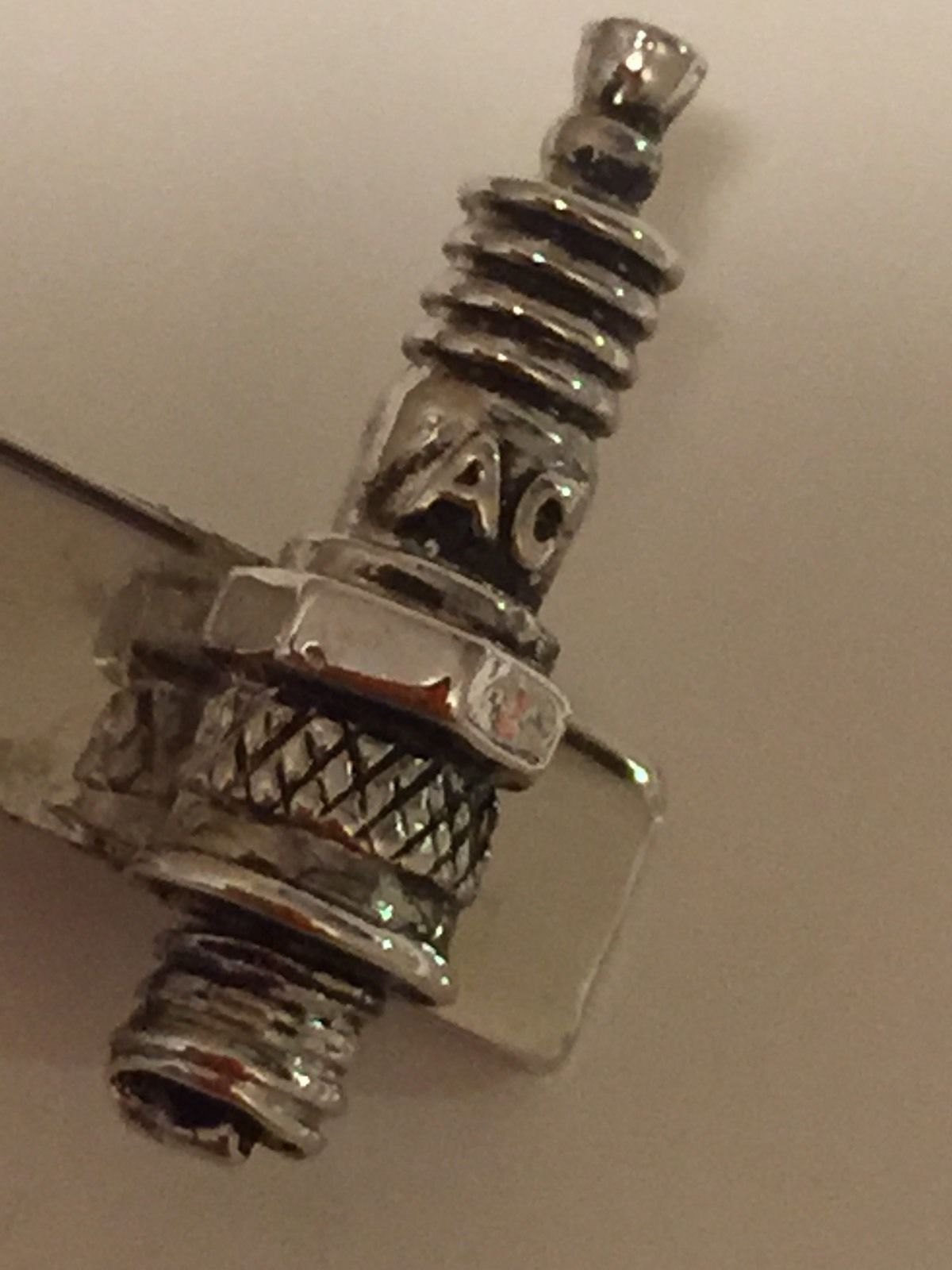 Flint Expatriates Flint Artifacts A.C. Spark Plug Tie Clip