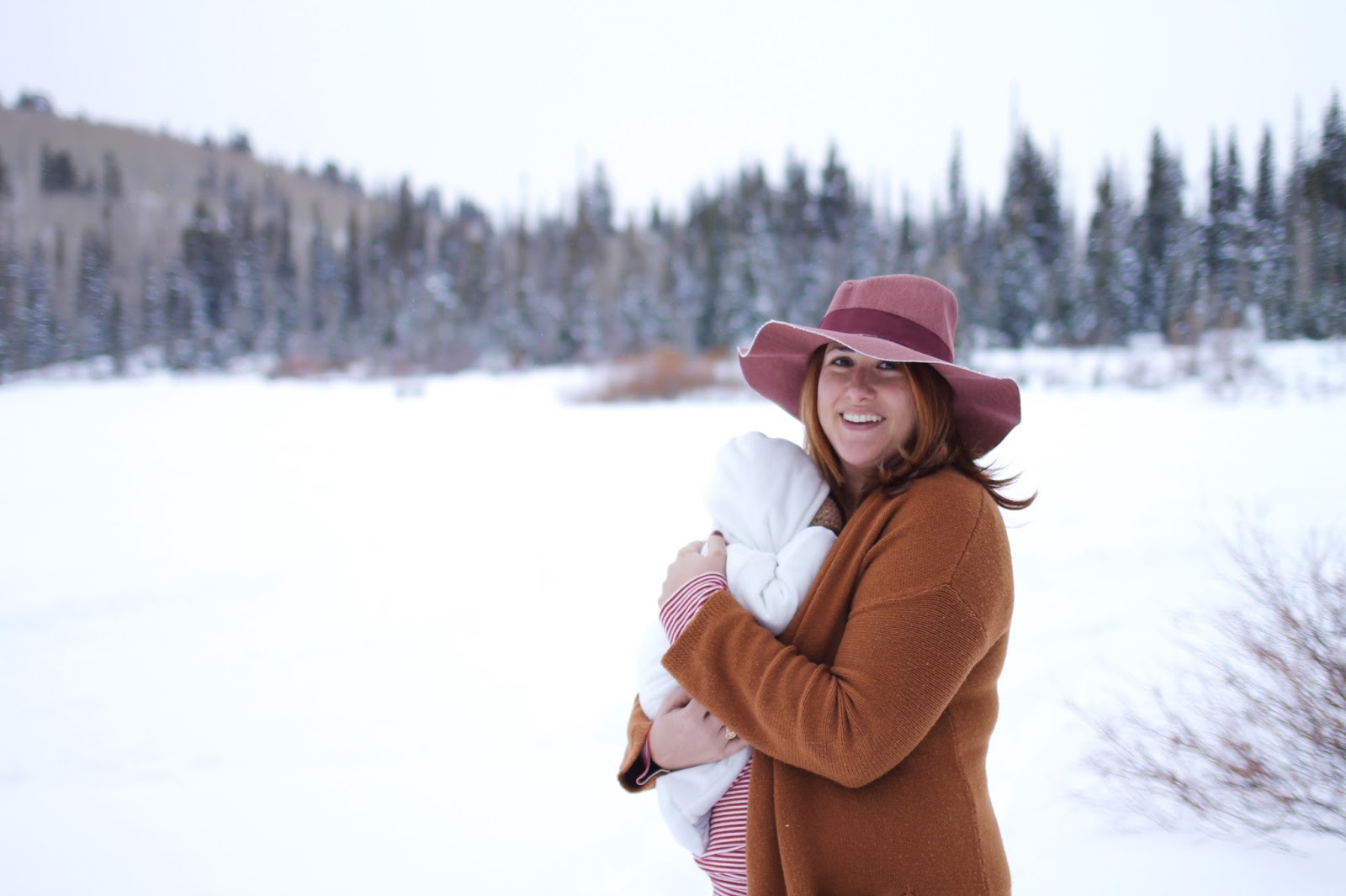 newborn, snow, new mom outfit, long sweater cardigan