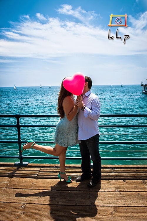 Özlem & Ersin hiding behind a balloon in Santa Monica, CA