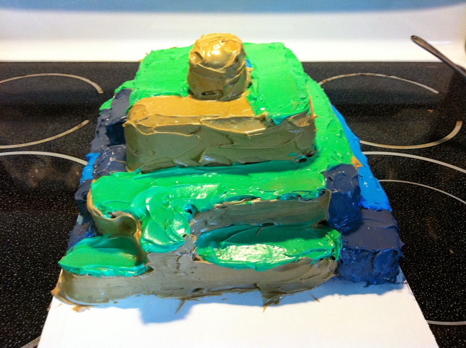 Minecraft cake side 4, featuring dirt and grass.
