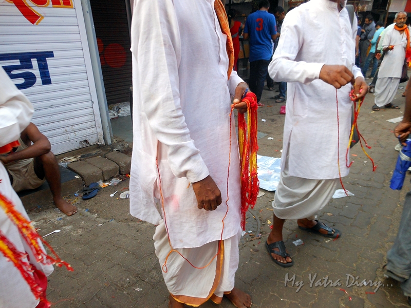 Red sacred threads at Lalbaugcha raja Pandal, Ganesh Pandal Hopping, Mumbai