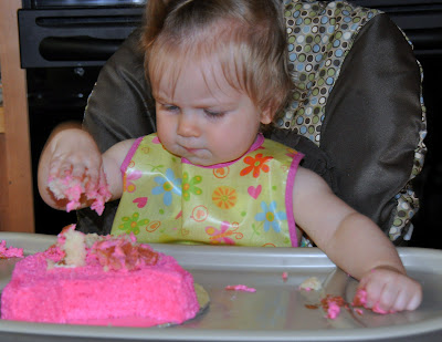 Birthday girl attacks pig cake