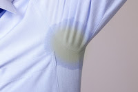 An unfortunate image of an under-arm stained dress shirt