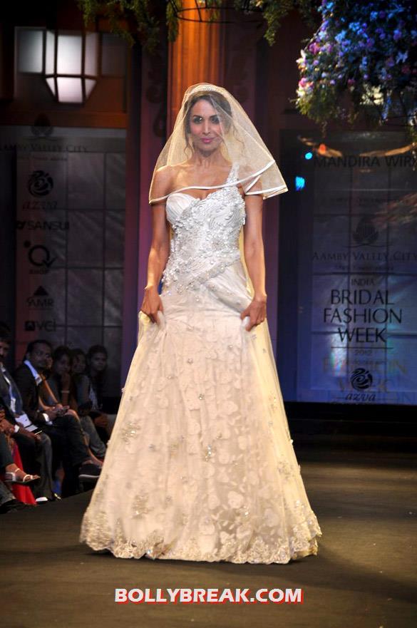 Malaika is an angel in white wearing a western wedding dress - Malaika Arora Khan at India Bridal Fashion 