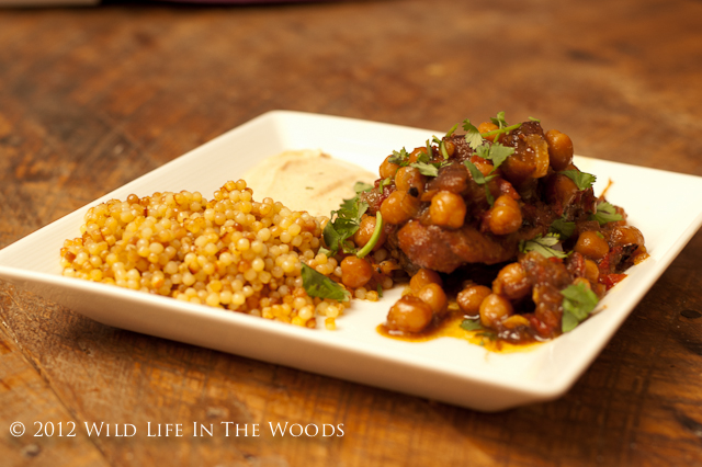 Chicken and Chickpea Tagine with Apricots and Harissa Sauce is so delicious! Go on an adventure in eating to Morocco, for the price of a few spices!