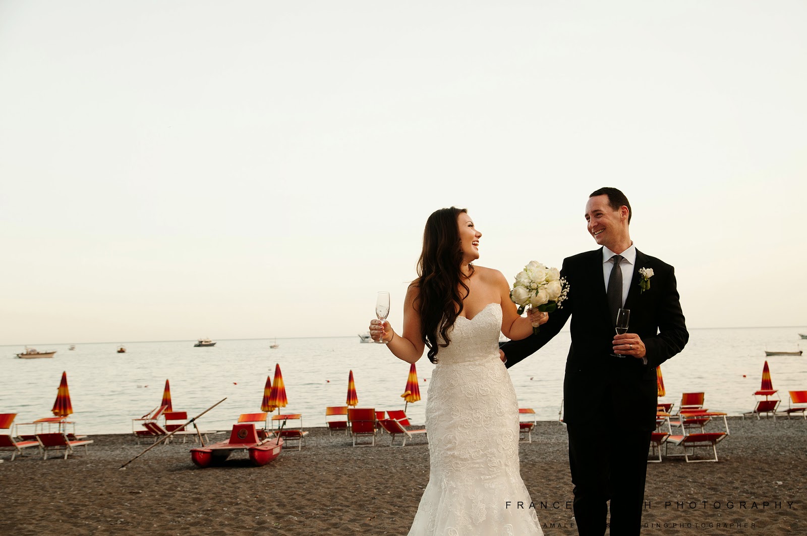 Bride and groom on Positano beach