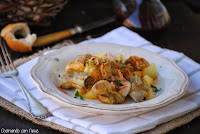 Alcachofas con patatas salteadas y cebolla confitada 