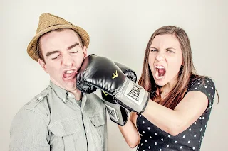 woman in a relationship boxing her partner