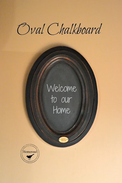 oval chalkboard with metal tag and overlay