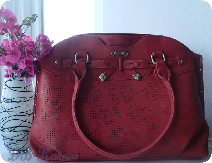 nica handbags official website