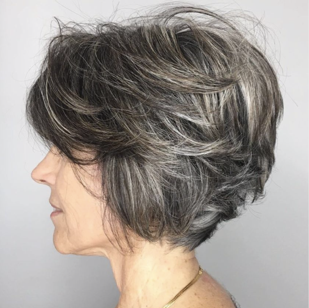 hairstyle for over 50 with glasses