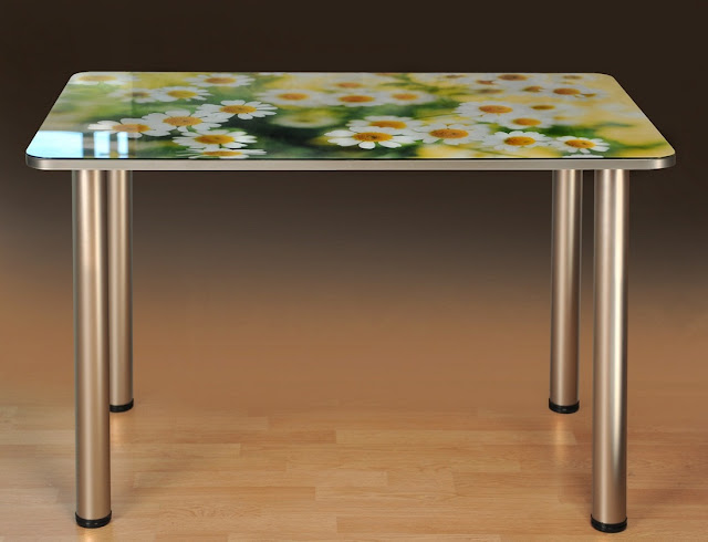 A glass table top with the flower print