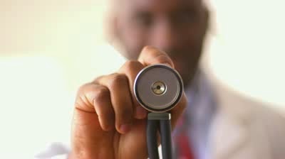 stock footage rack focus between stethoscope and black doctor Dear LIB readers; Letter from another Nigerian doctor