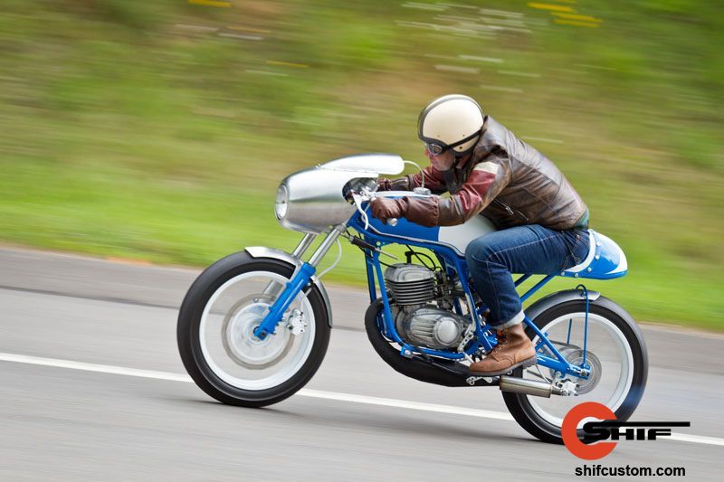 the creator of the Detonator Minsk motorcycle riding it
