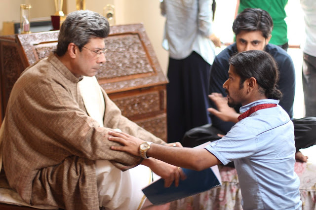 Director Dev Gupta briefing the cast members of Qissbah