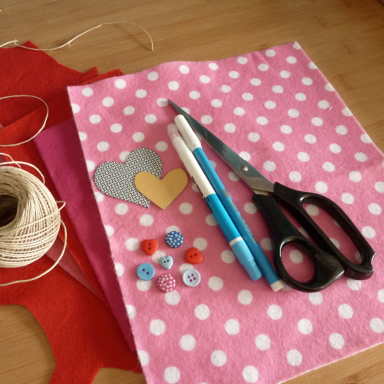 pink polka dot felt fabric and materials to make a DIY garland