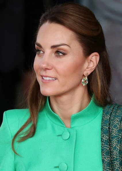 Kate Middleton wore a blue Kurta and trousers by Pakistani designer Maheen Khan and the Zeen earrings. Catherine Walker tunic