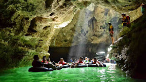 The beauty of cave Pindul with a river flowing in it