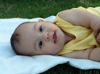Baby in yellow. Stock Photo credit: mirichi