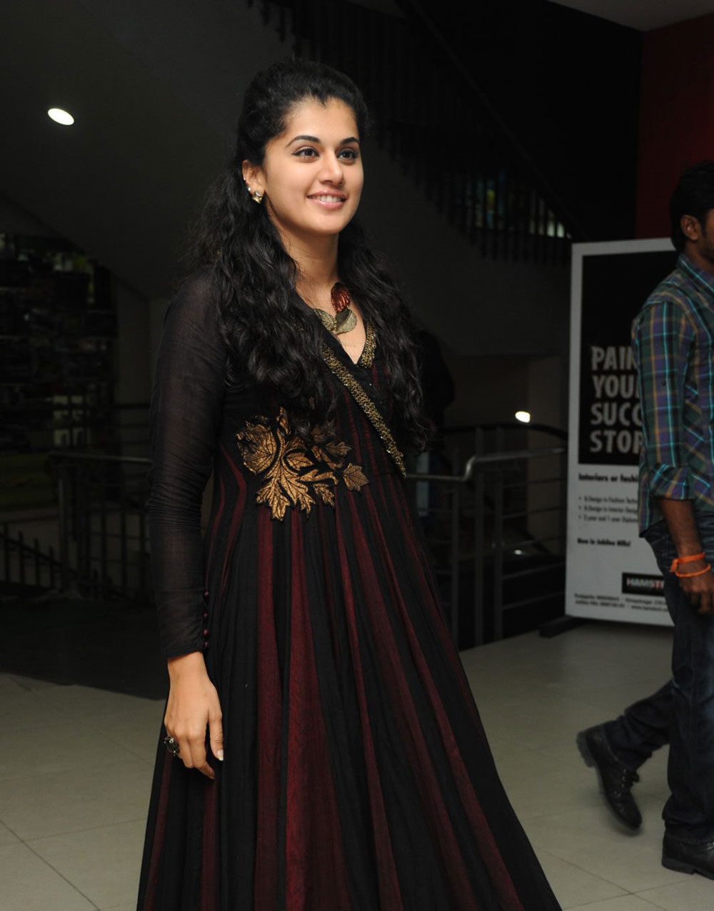 Glamorous Taapsee Pannu Smiling Photos In Maroon Dress