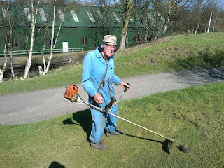 Vic strimming the picnic area at Marley Hill