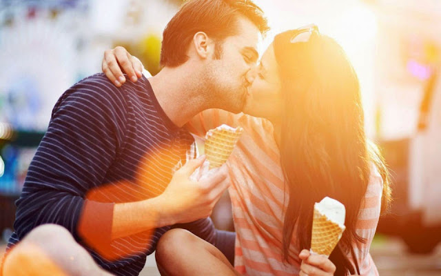 Romantic Love couple with ice cream during kiss