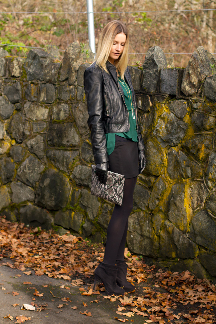 Vancouver Fashion Blogger, Alison Hutchinson, wearing Forever 21 pleather jacket, Zara forest green top, True Worth Design crystal pendant necklace, Urban Outfitters black bodycon skirt, H&M snakeskin envelope clutch, Zara black suede booties, Danier black leather gloves