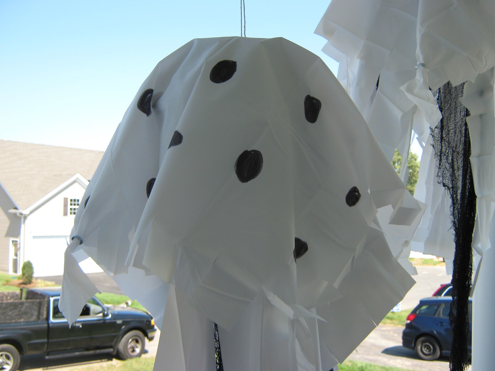 fake-it-frugal-holidays-make-your-own-shower-curtain-ghosts