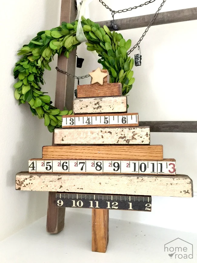 Repurposed Vintage Ruler Tree and a boxwood wreath