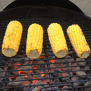 Mexican-Inspired Grilled Corn on the Cob by www.smokeandvanilla.com - A grilled corn on the cob recipe with a Mexican twist that includes instructions on how to prepare in the husk, in foil, or with husks removed. An easy and healthy summer food side dish featuring mayonnaise, lime, and Parmesan cheese. http://bit.ly/2o071EJ