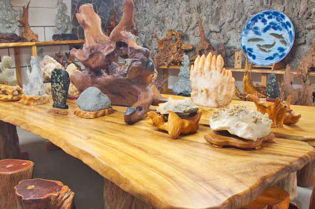 wood table, stone carvings,cave